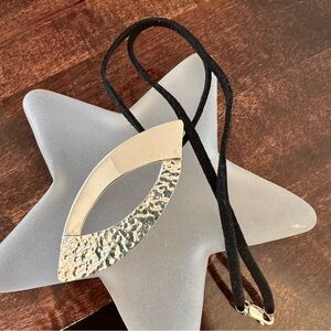 Silver silver pendant on 16in suede cord